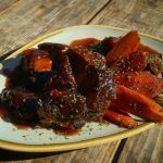 Ale 8 One Bourbon Glazed Burnt Ends with House Made Collards and Sautéed Carrots-Willies locally known